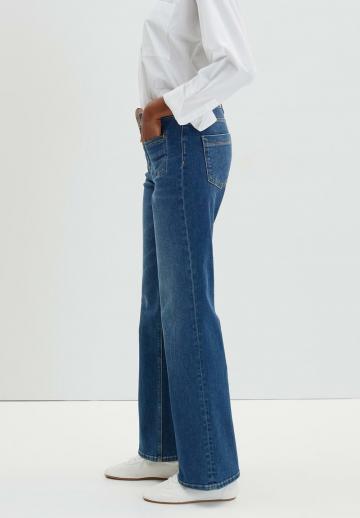Клешеные джинсы