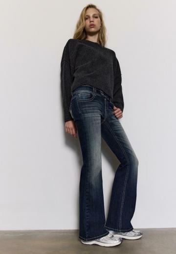 Клешеные джинсы