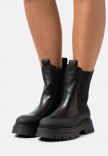 Широкие сапоги