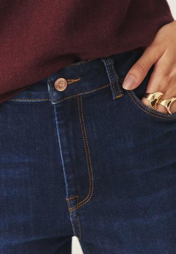 Клешеные джинсы