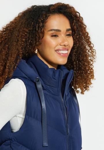 Длинный жилет