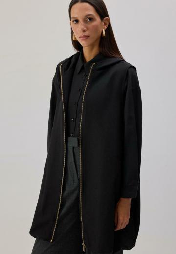 Длинный жилет