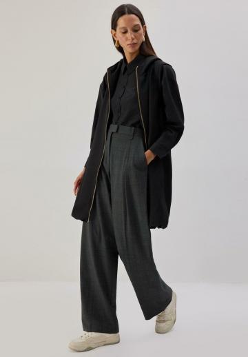 Длинный жилет