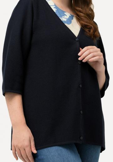 Длинный жилет