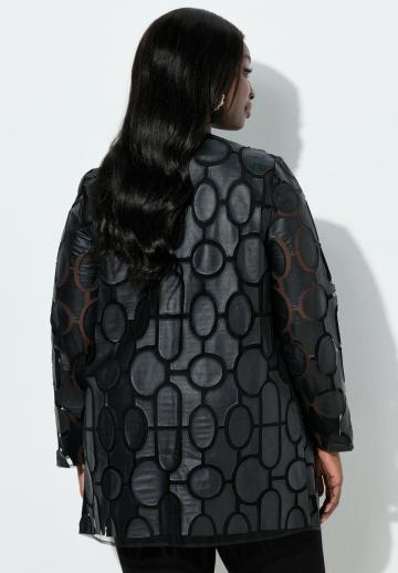 Пальто из искусственной кожи