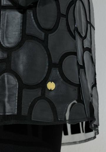 Пальто из искусственной кожи