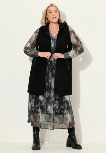 Длинный жилет