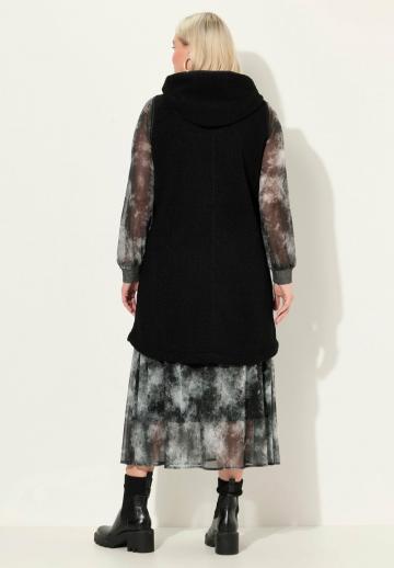 Длинный жилет