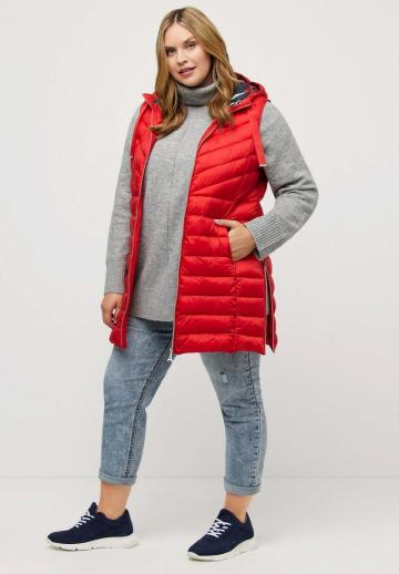 Длинный жилет