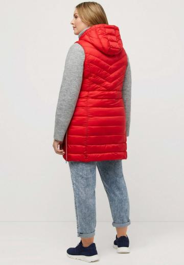 Длинный жилет