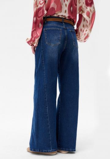 Клешеные джинсы