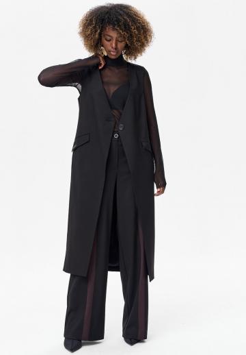 Длинный жилет