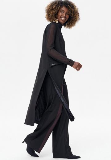 Длинный жилет