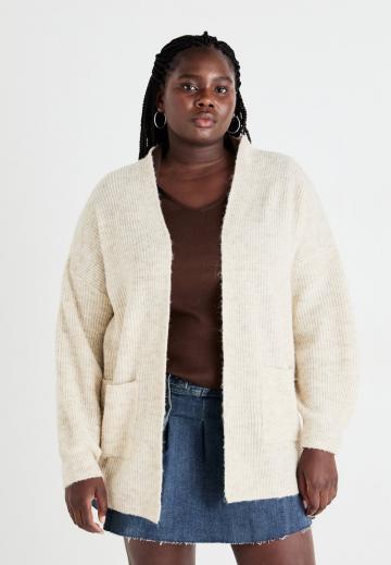 Длинный жилет