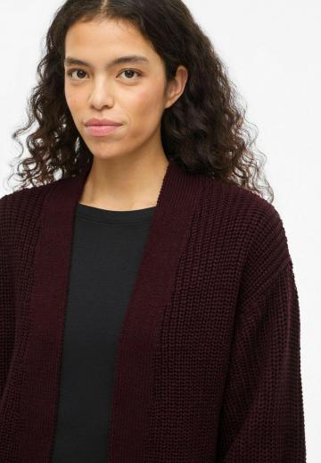 Длинный жилет