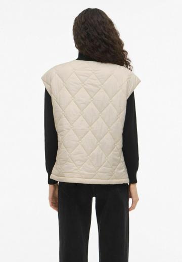 Стеганый жилет