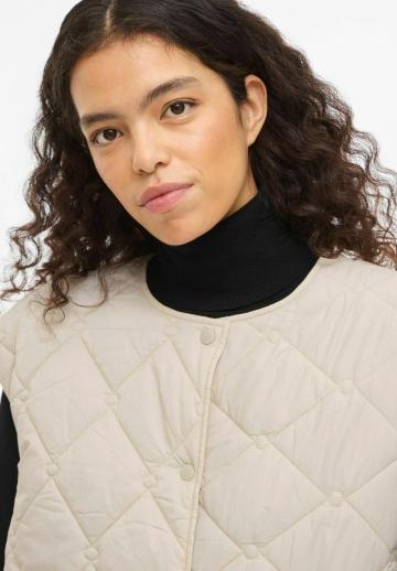 Стеганый жилет