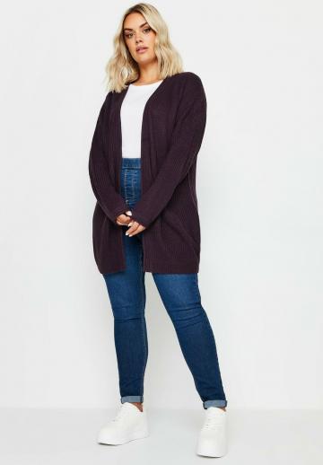 Длинный жилет