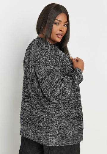 Длинный жилет