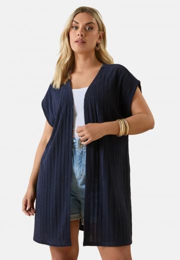 Длинный жилет