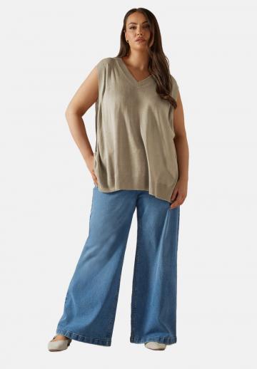 Длинный жилет