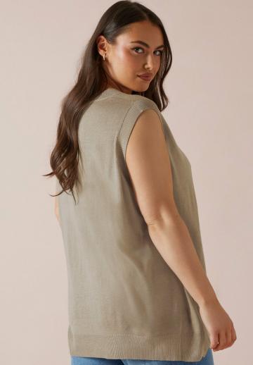 Длинный жилет