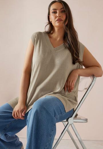 Длинный жилет