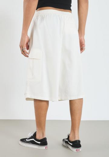Юбка с накладными карманами
