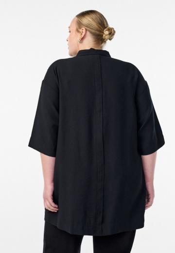 Длинная блузка