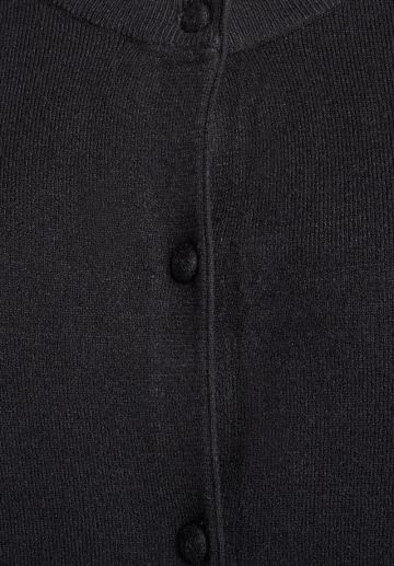 Вязаный жилет