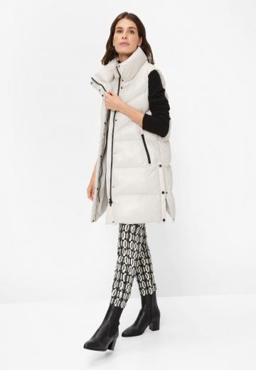 Длинный жилет