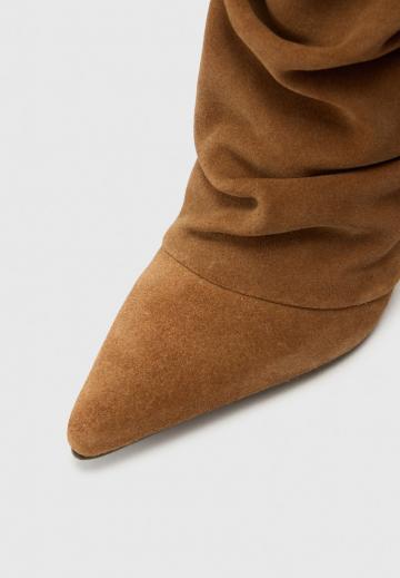 Высокие сапоги