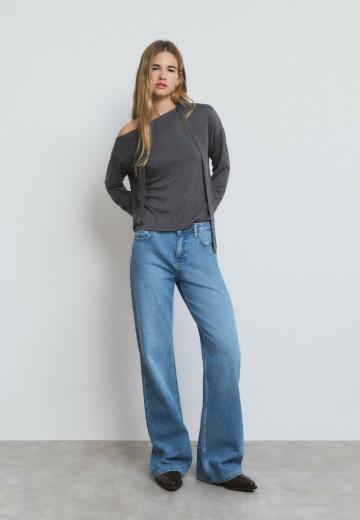 Клешеные джинсы