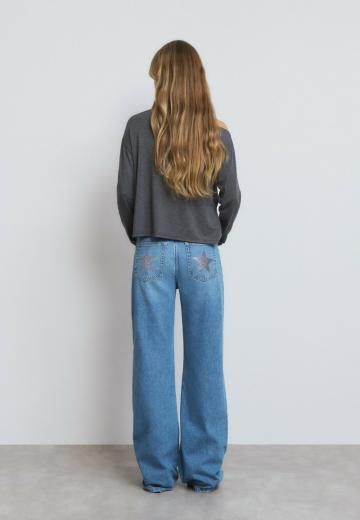 Клешеные джинсы