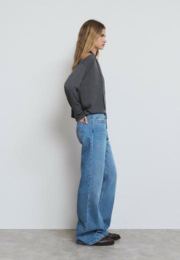 Клешеные джинсы