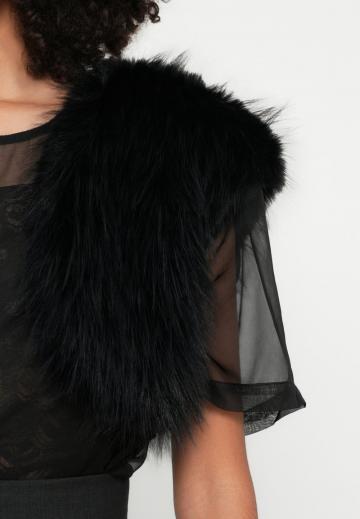 Пуховой жилет