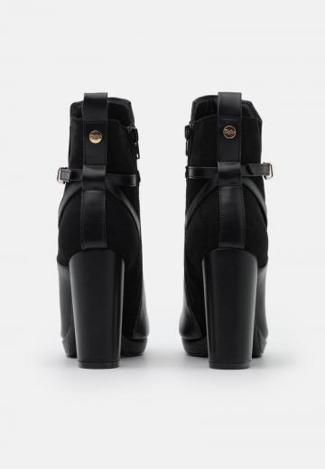 Полусапожки на высоком каблуке