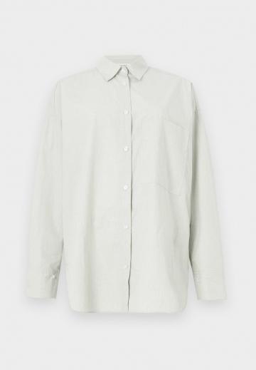 Длинная блузка