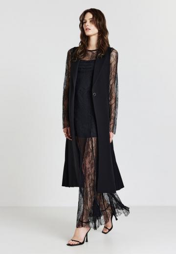 Длинный жилет