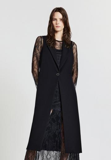 Длинный жилет