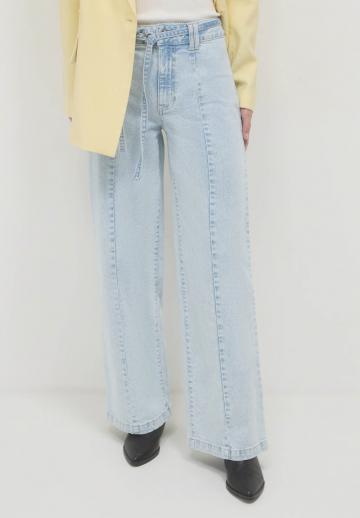 Клешеные джинсы
