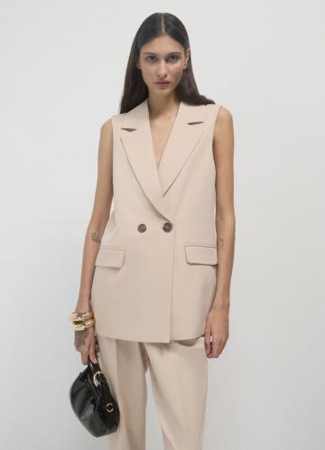 Длинный жилет