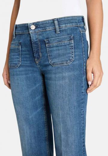 Клешеные джинсы