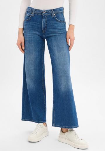 Клешеные джинсы