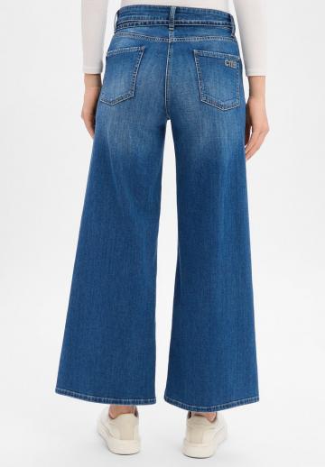 Клешеные джинсы