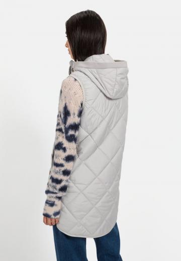 Длинный жилет