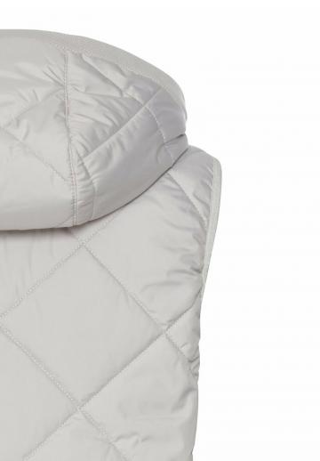 Длинный жилет