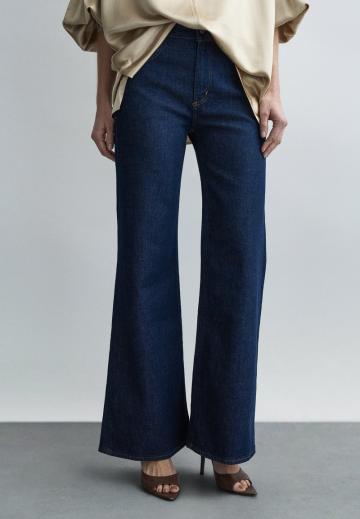 Клешеные джинсы