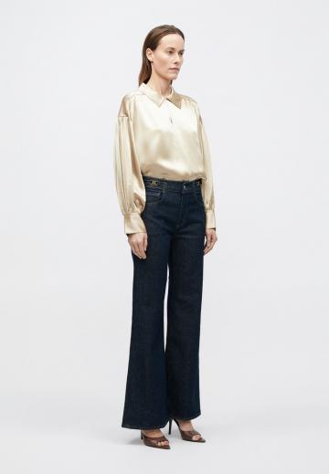 Клешеные джинсы