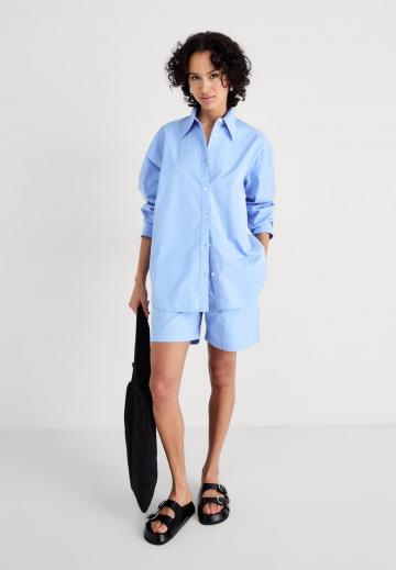 Длинная блузка